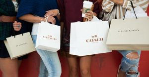 In this photo that ran with the NTCC's Facebook ad for Fashion Outlet Mall, it appears that Burberry and Coach are two examples of what the NTCC considers "small businesses".