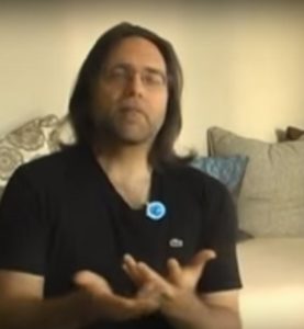 Keith Raniere teaches women who vow to serve him.