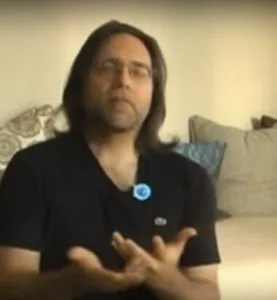 Keith Raniere teaches women who vow to serve him.