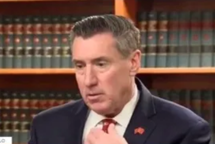 Former DA John Flynn’s Accuser Speaks From Jail as Case File Reveals New Details