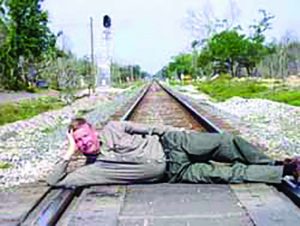 Artist’s conception: Mayor Paul Dyster poses in front of his new train station. Even if there are few trains and almost no riders, he can at least boast he built a new train station - empty though it may be. 
