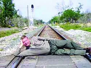 Artist’s conception: Mayor Paul Dyster poses in front of his new train station. Even if there are few trains and almost no riders, he can at least boast he built a new train station - empty though it may be. 