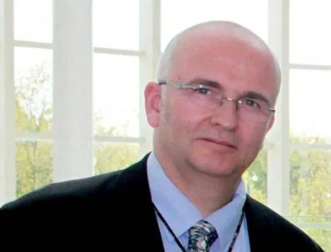 British surgeon who branded patients’ livers with his initials pleaded guilty to assault