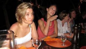 Miss Mack [left] formerly ate as she pleased and drank alcoholic beverages. After becoming a follower of Mr. Raniere she requires his permission to imbibe. Mr. Raniere has guided her into a 500 calorie diet.