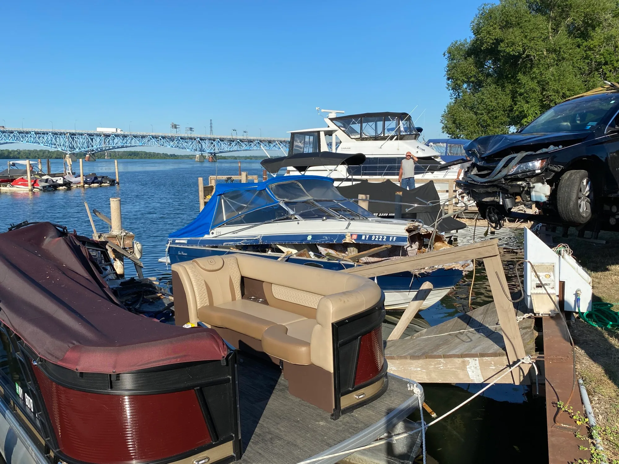 Spider Attack Causes Driver to Lose Control of Vehicle; Crash into Boats Docked at Yacht Club