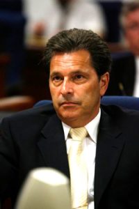 Dennis Virtuoso (above) takes the lead in opposing the development of a lodge in Goat Island.