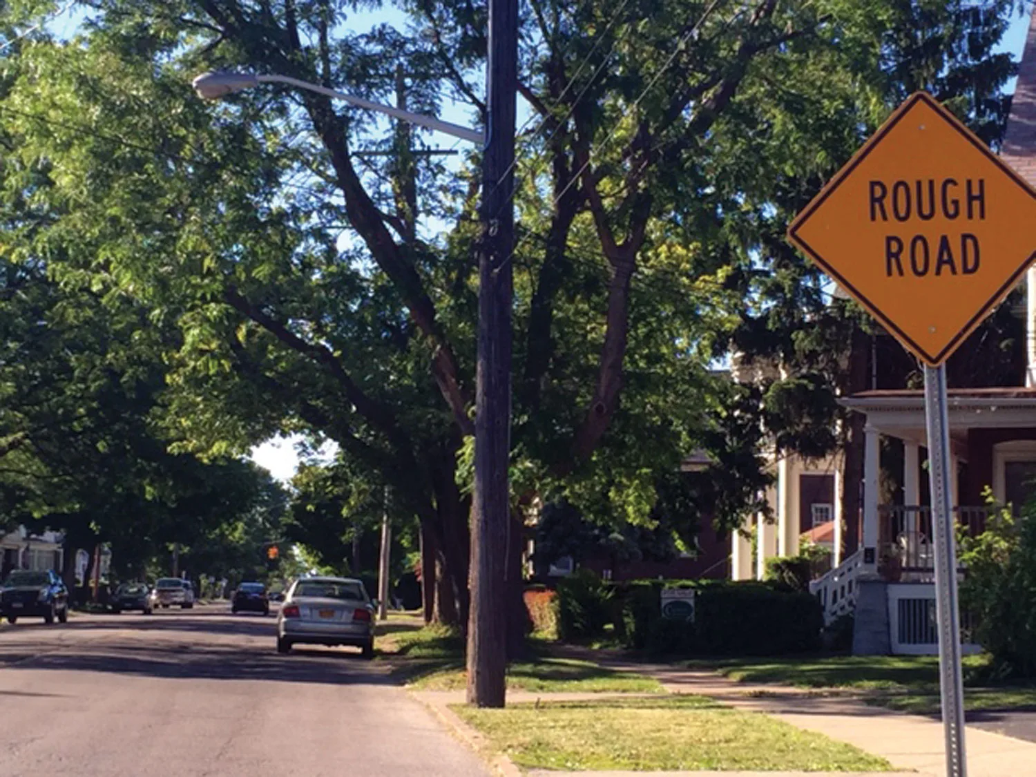 Signs Of The Times: Rough Road Signs are Easier to  Install Than Fixing Rough Road