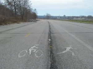 Ancient pictoglyphs on the closed lanes of the Niagara Scenic Parkway reveal that prehistoric cultures liked to run each other down with bicycles.