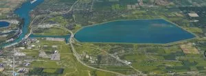 The Lewiston Reservoir (background) contains billions of gallons of water. The federal government recently ordered NYPA to update emergency flooding plans in light of possible leaking. The village of Lewiston, the town of Niagara and the Tuscarora Reservation are located next door to the huge, elevated reservoir.